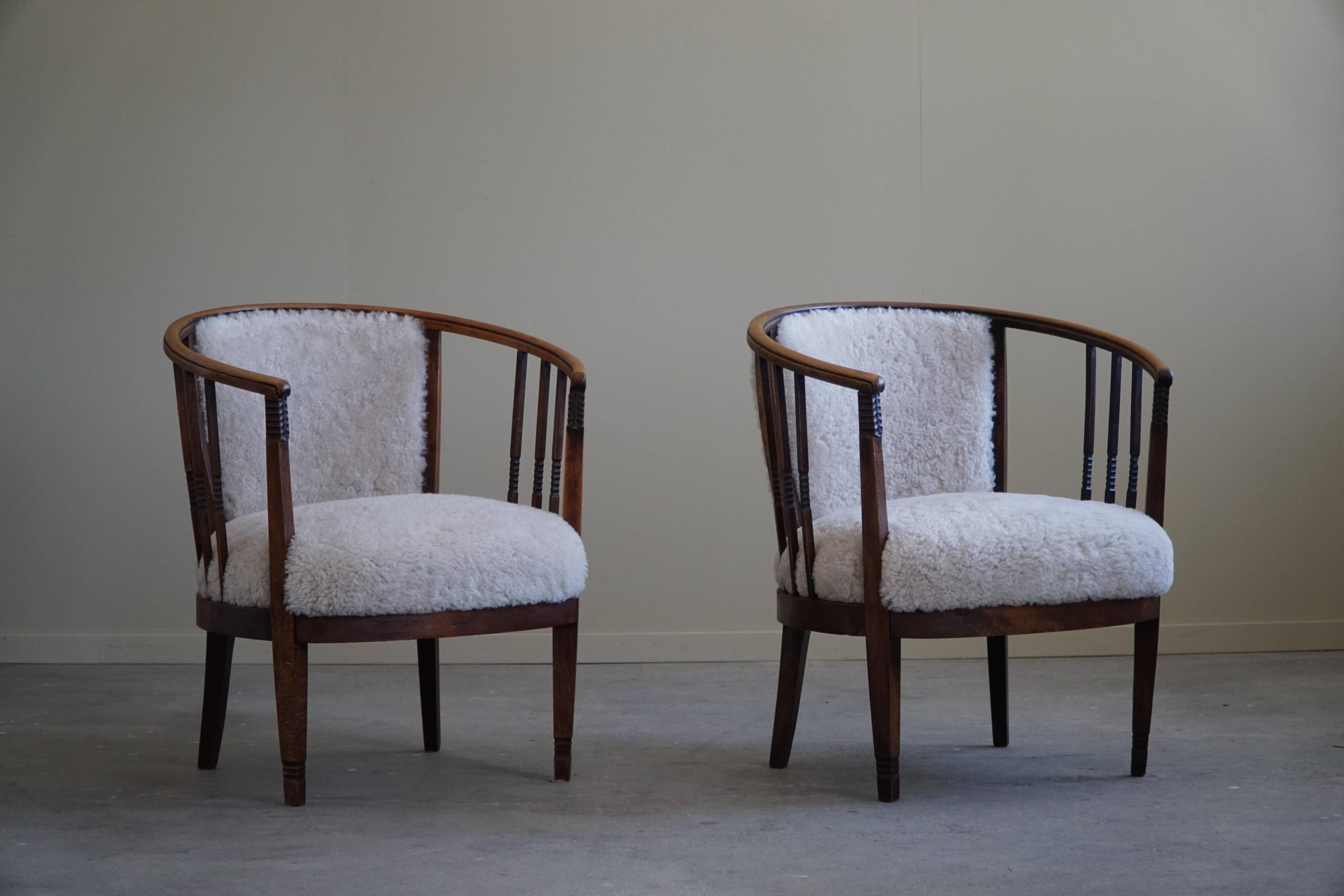 Pair of Danish armchairs in beech, reupholstered in lambswool, Art Nouveau, 1900s.