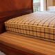 Walnut rocaille bed from the early 20th century.