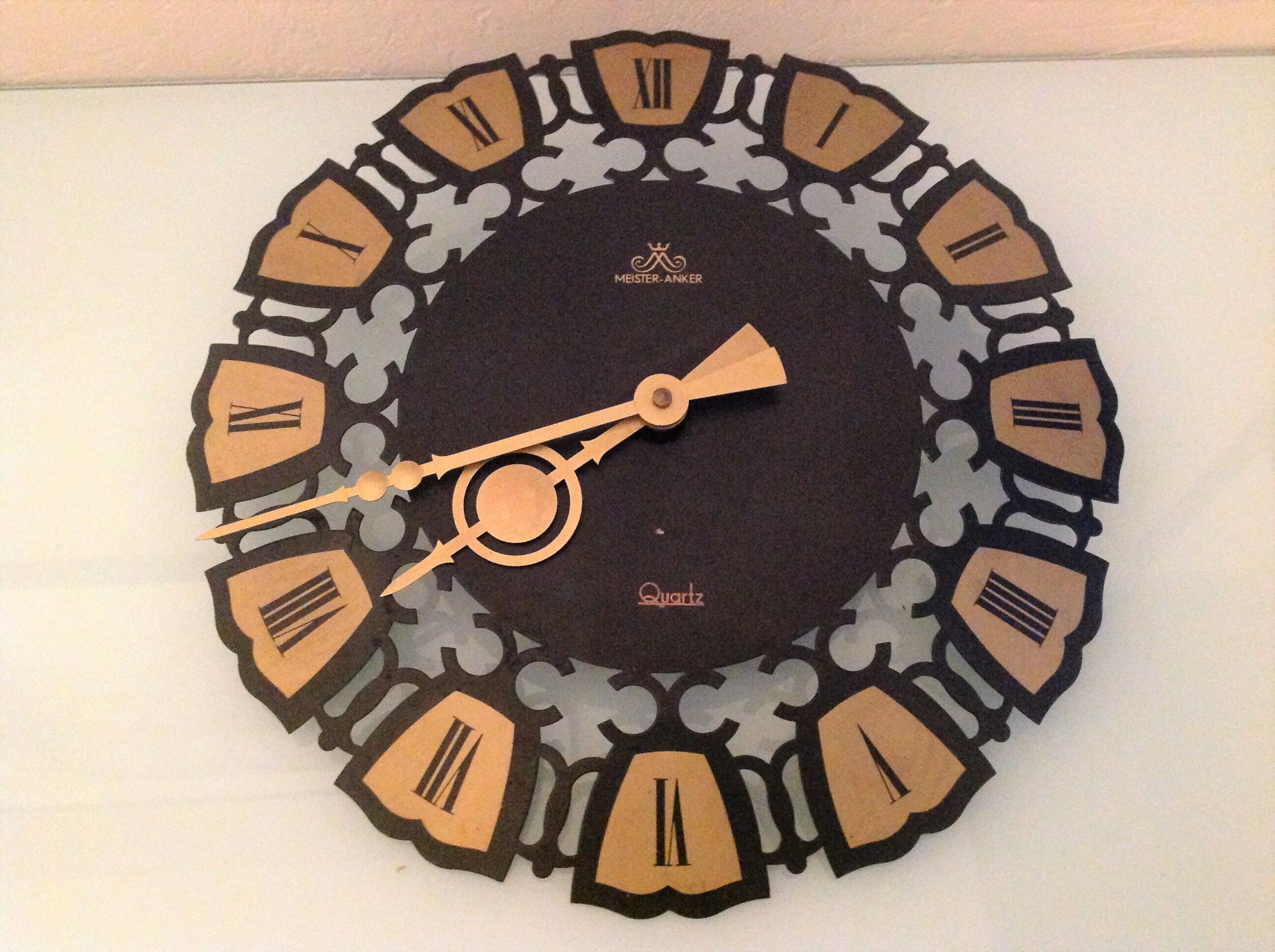 Black and gold metal clock by Meister Anker / vintage 60s-70s