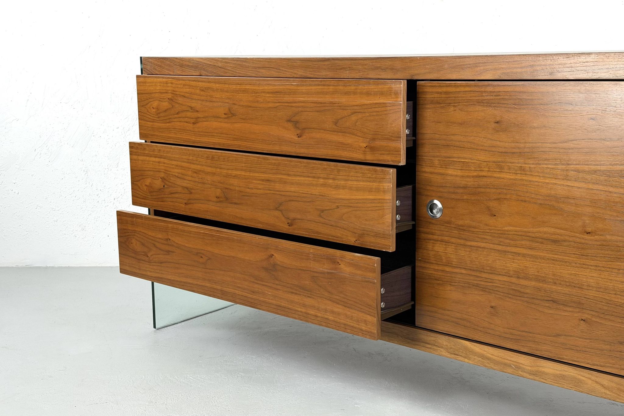 Teak sideboard with glass legs, France - 1990s