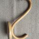 Curved wooden coat hook