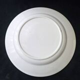 Plat rond semi-creux en faïence de Badonviller