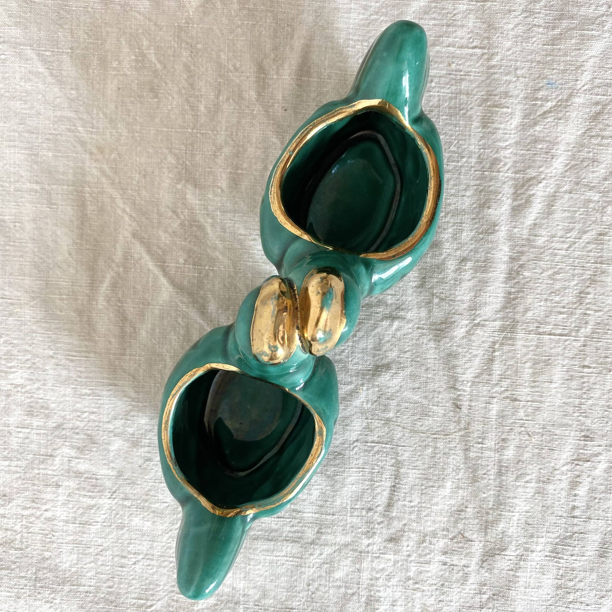 Salt and pepper shakers with chickens in slip