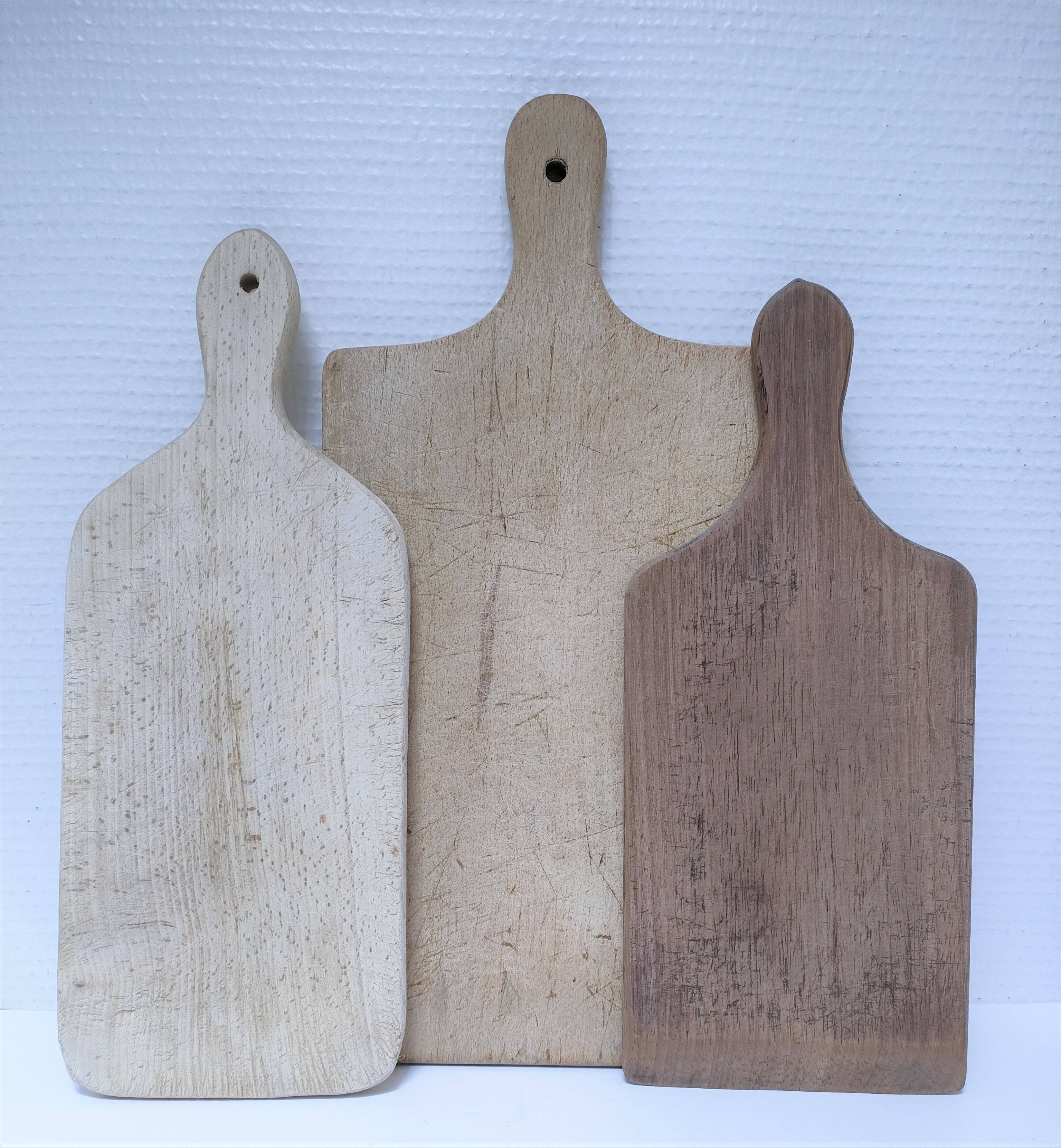 Three vintage solid wood cutting boards