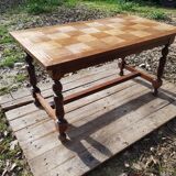 Vintage wooden table with checkerboard pattern
