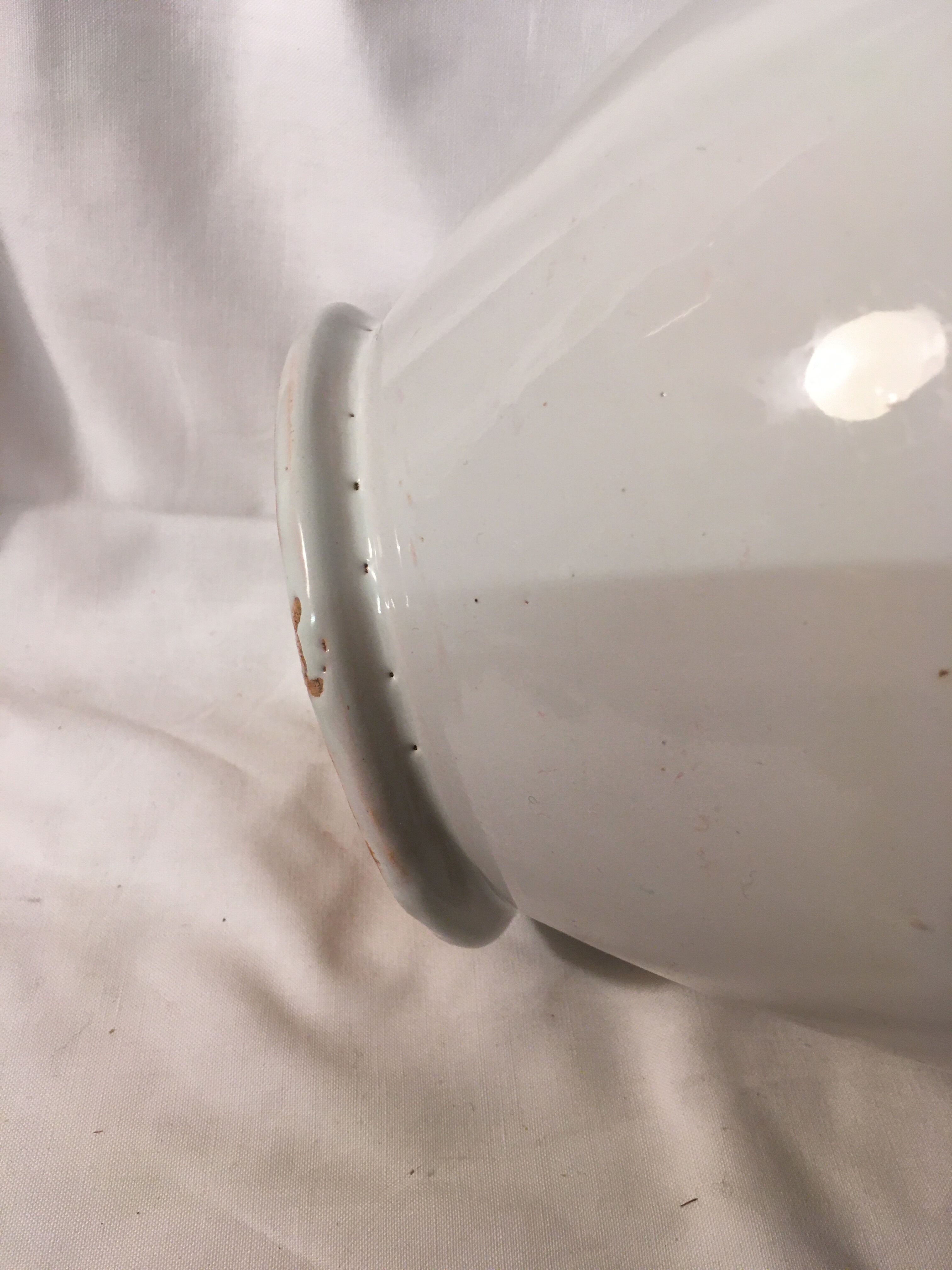 Old chevrette / pitcher in white earthenware