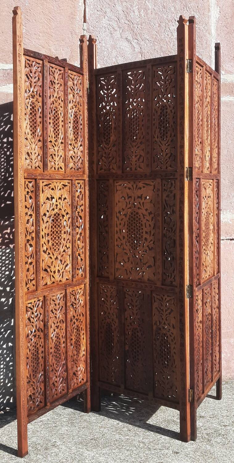 Carved solid wood screen.