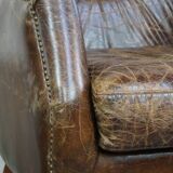 Grained cowhide armchair with a timeless design