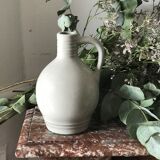 Pitcher with ceramic handle