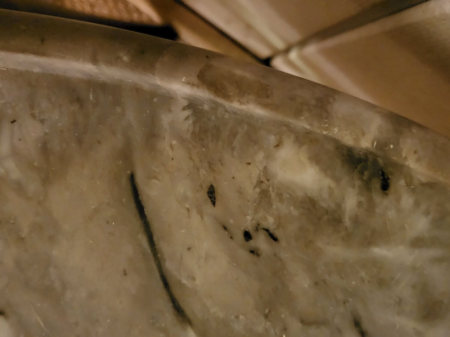 Pedestal table above marble