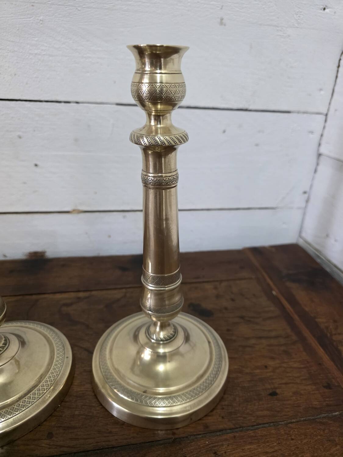 Antique pair of brass candlesticks