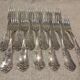 12 silver-plated metal table forks by Boulenger in the Louis XV style, demi-rich.