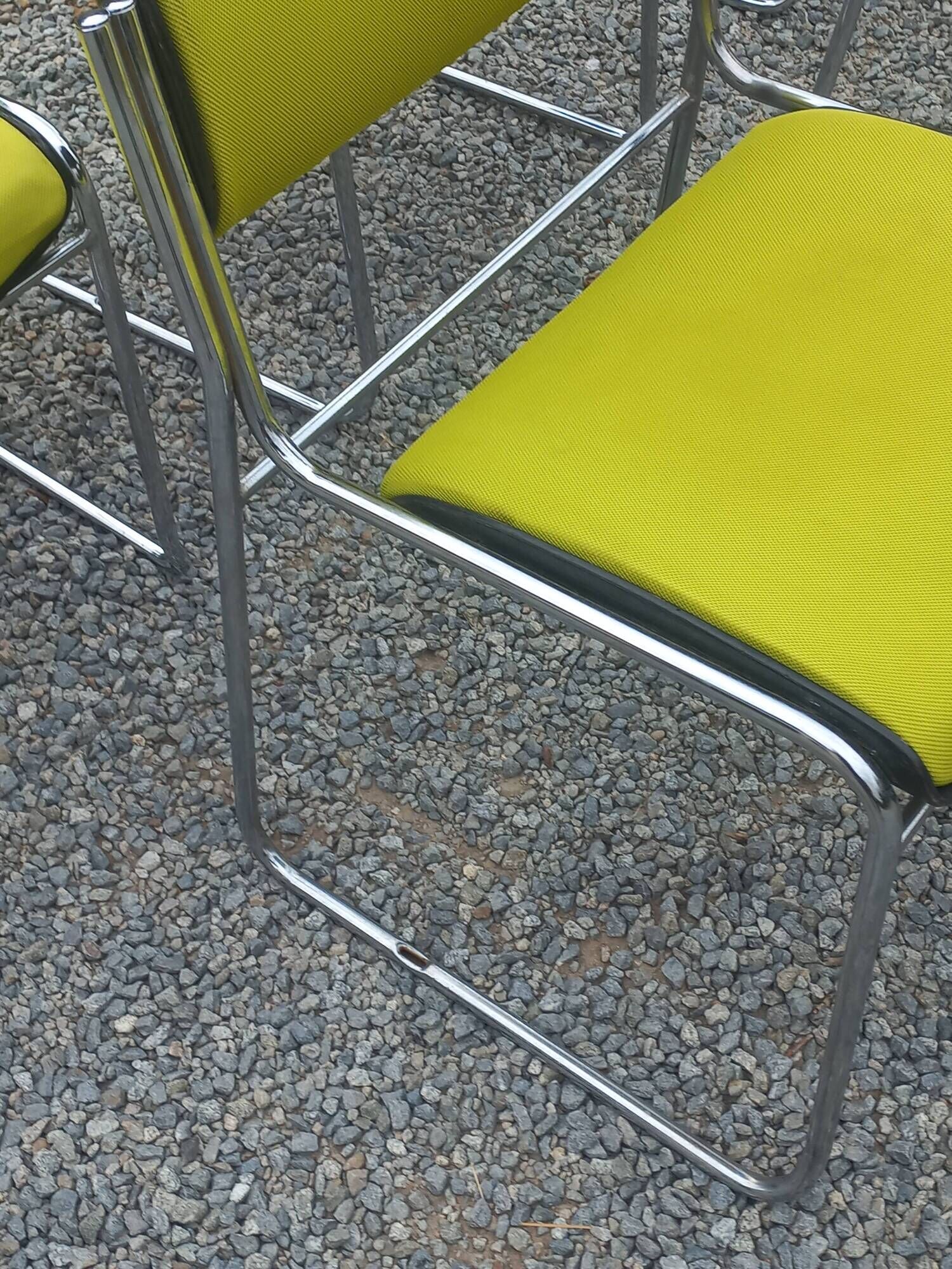 Set of 6 designer chairs with wooden seats and backs, chrome legs.