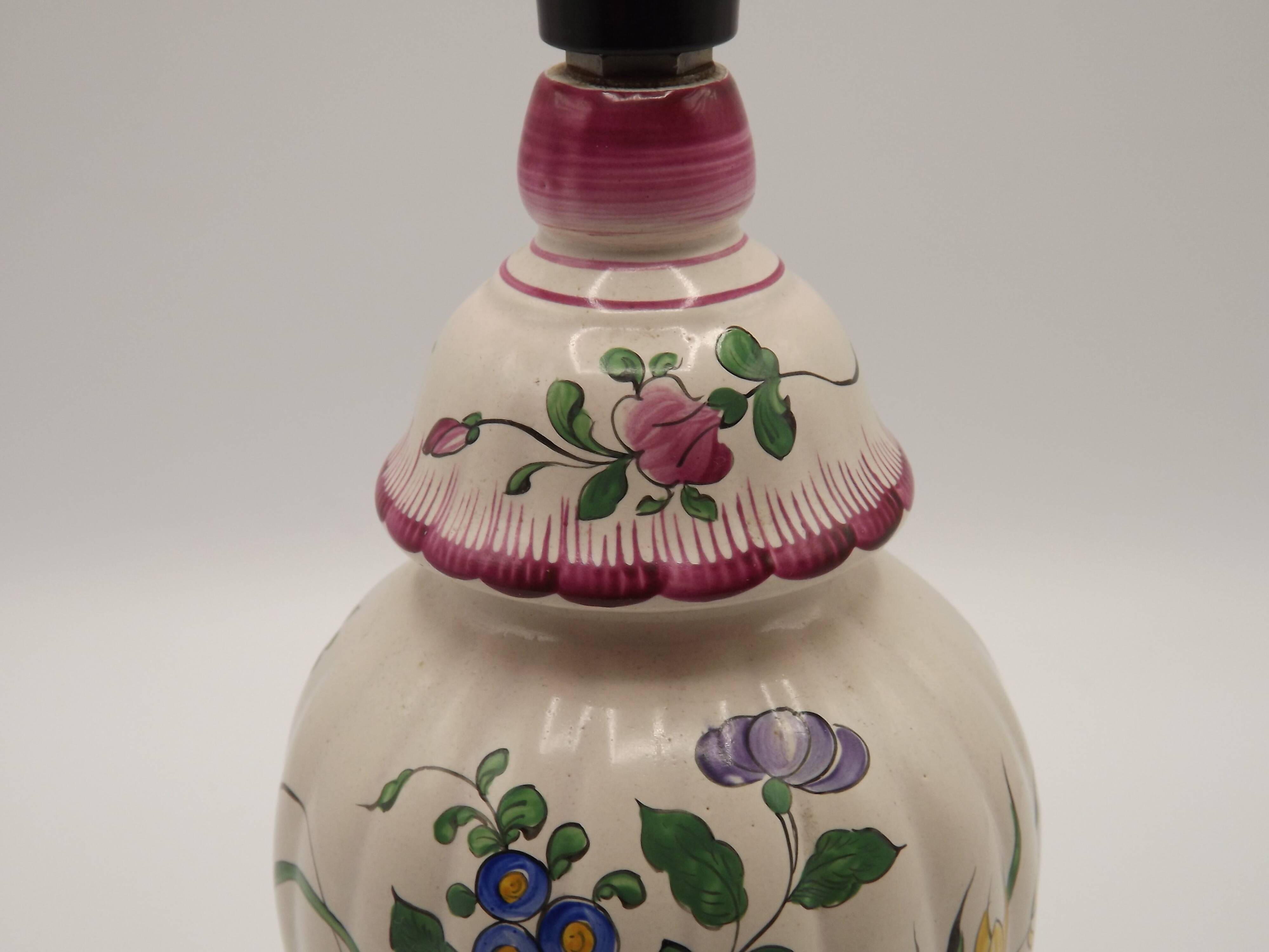 Pretty French vintage hand-painted ceramic floral lamp base on wooden plinth.