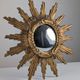 Convex sunburst mirror in carved and gilded wood, 1950s