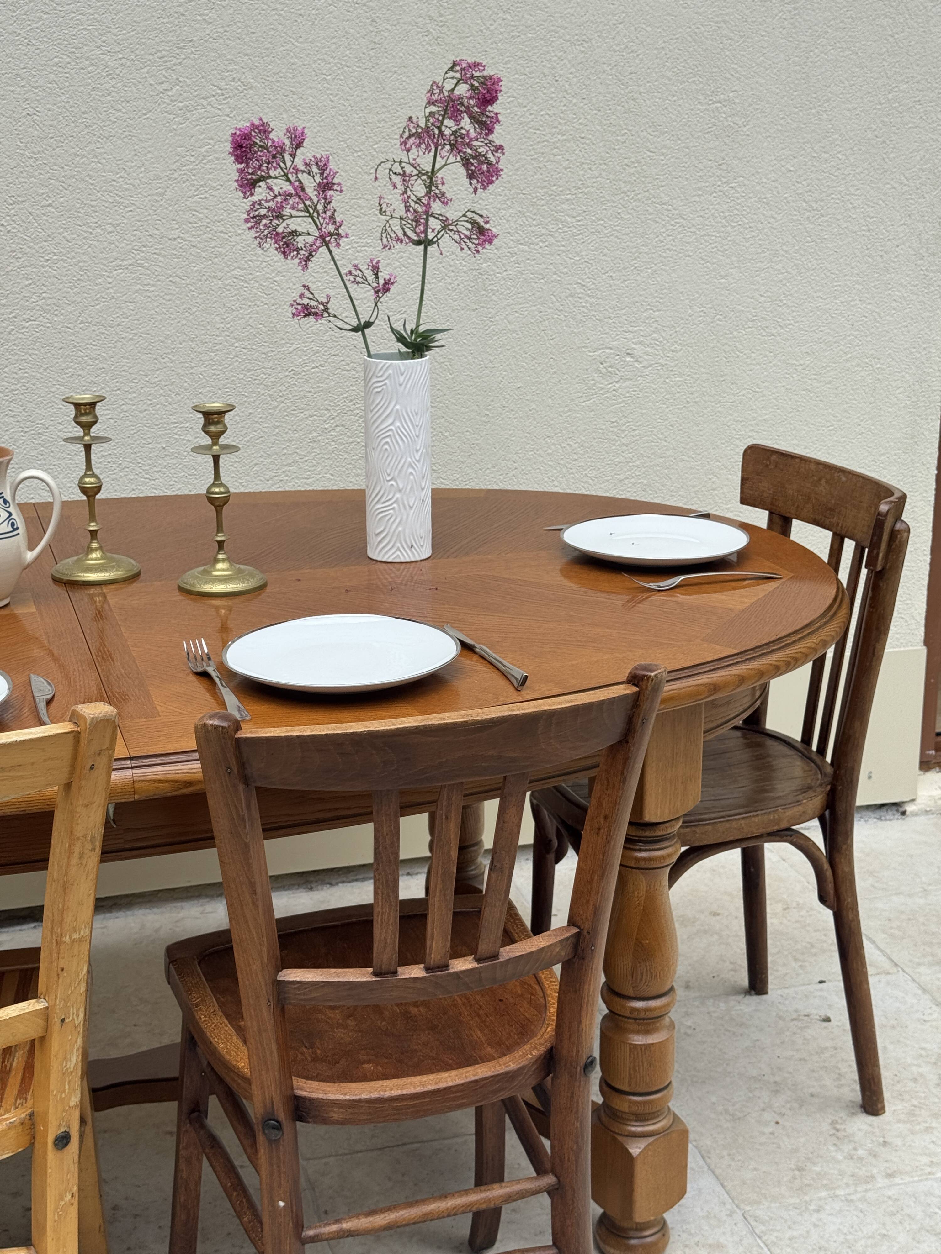 Oak dining table, oval living room table with two extensions.