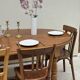 Oak dining table, oval living room table with two extensions.
