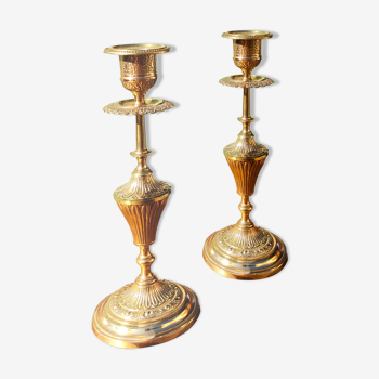 Pair of chiseled brass candle holders