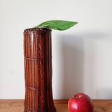 Japanese vase made of woven bamboo. Ikebana