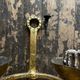 Pair of XXL torchlight sconces in golden beaten iron Italian work 1960