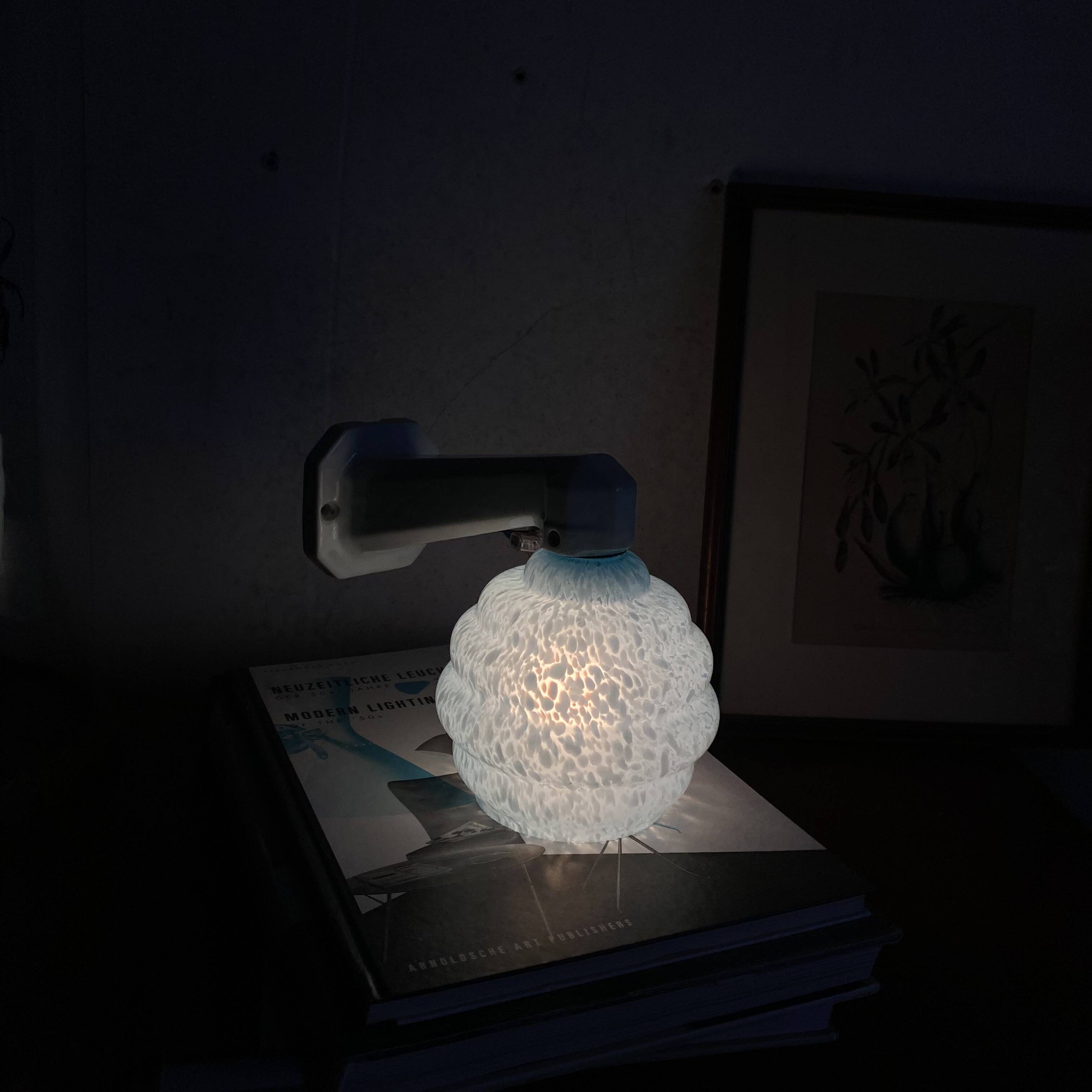 Ceramic wall lamp with a swan neck and blue glass globe Clichy