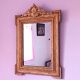Napoleon III mirror with rich gilded ornamentation