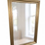 Golden mirror in oak from the 19th century.