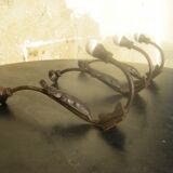 Trio of vintage coat hooks.