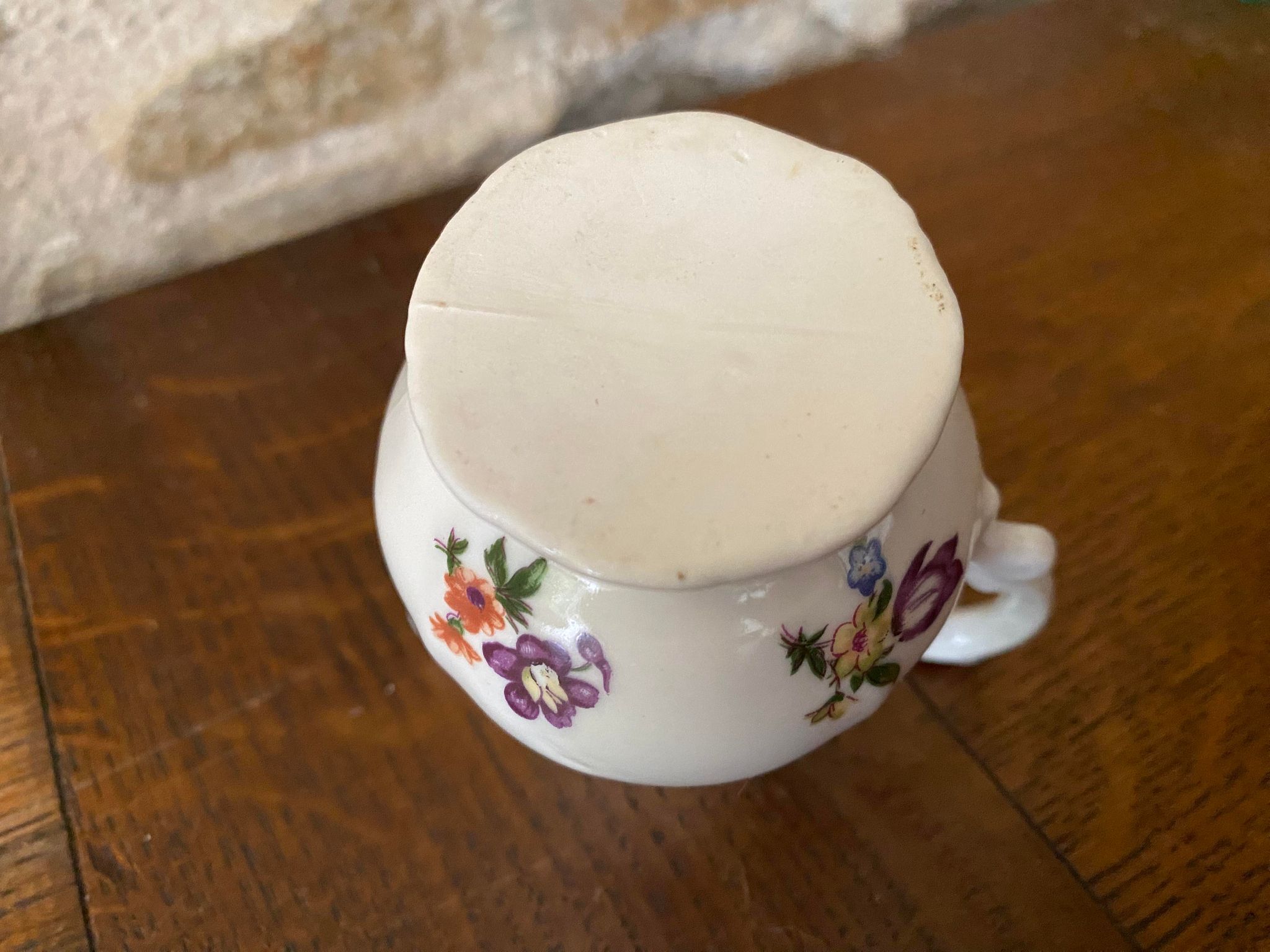 Small milk jug or creamer decoration flowers and golden edge
