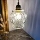 Baladeuse avec globe vintage en verre