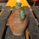 Antique red and green terracotta carafe, rustic Hungarian jug from the 1920s.