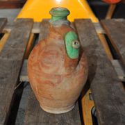 Antique red and green terracotta carafe, rustic Hungarian jug from the 1920s.