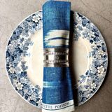 Monogrammed silver napkin ring with palmette and beaded motifs