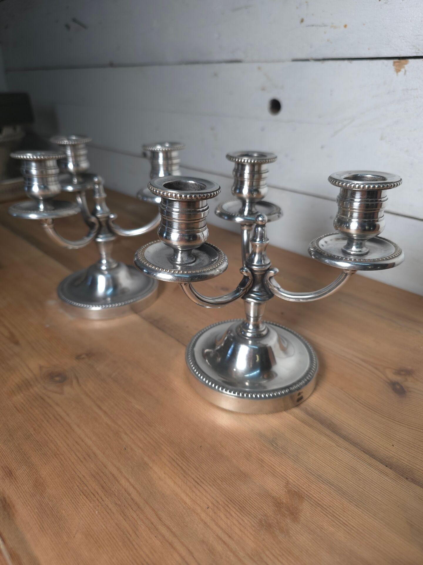 Pair of silver-plated candlesticks