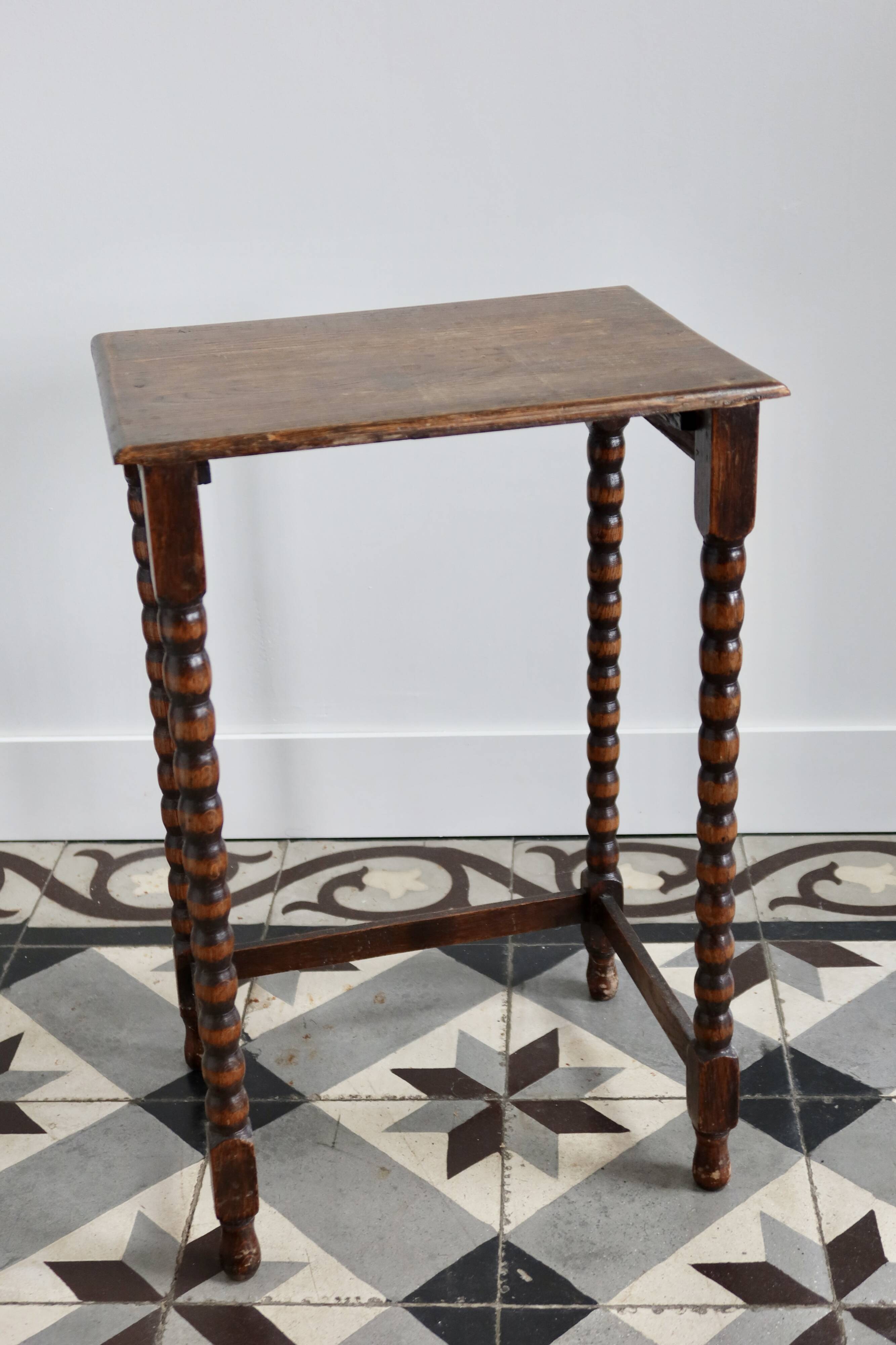 4 antique nesting tables made of turned wood