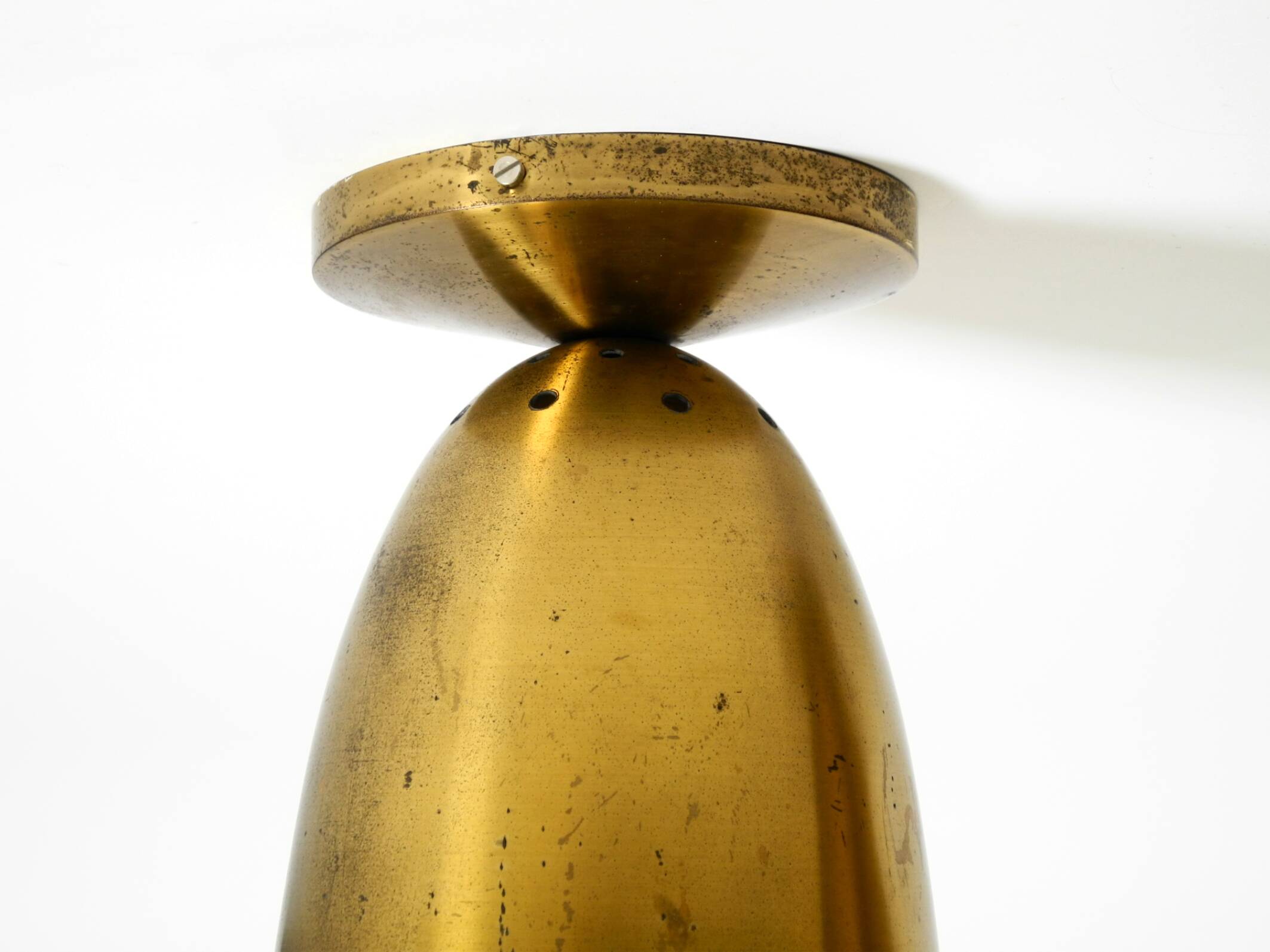 A pair of large, original Mid Century Modern brass ceiling lamps
