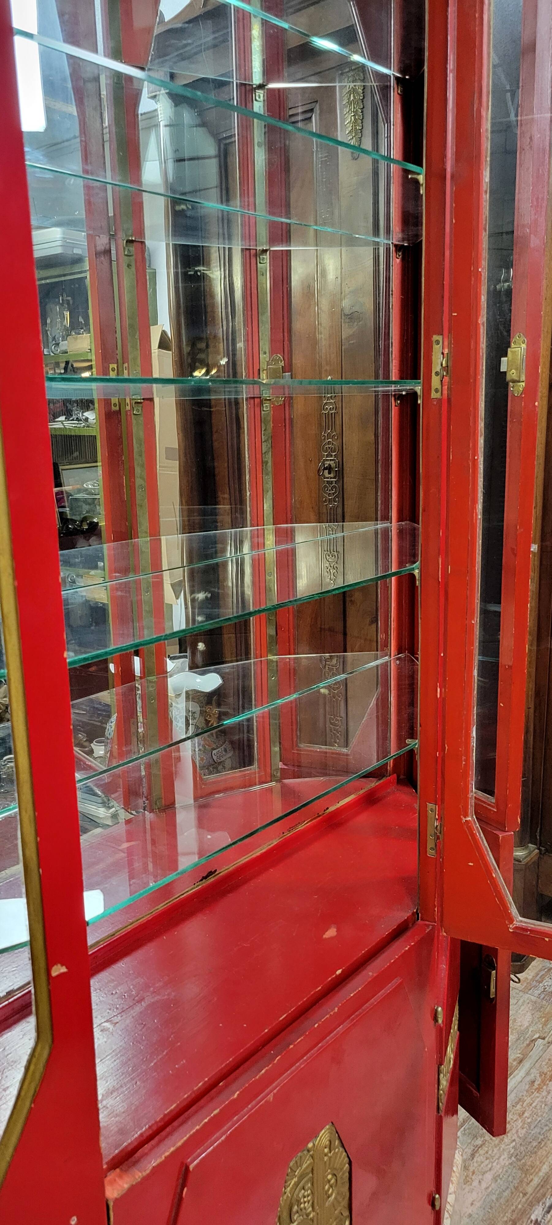 Important Art Deco period bookcase in lacquered wood and gilded bronze