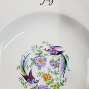 6 deep plates made of Limoges porcelain with a paradise bird design.