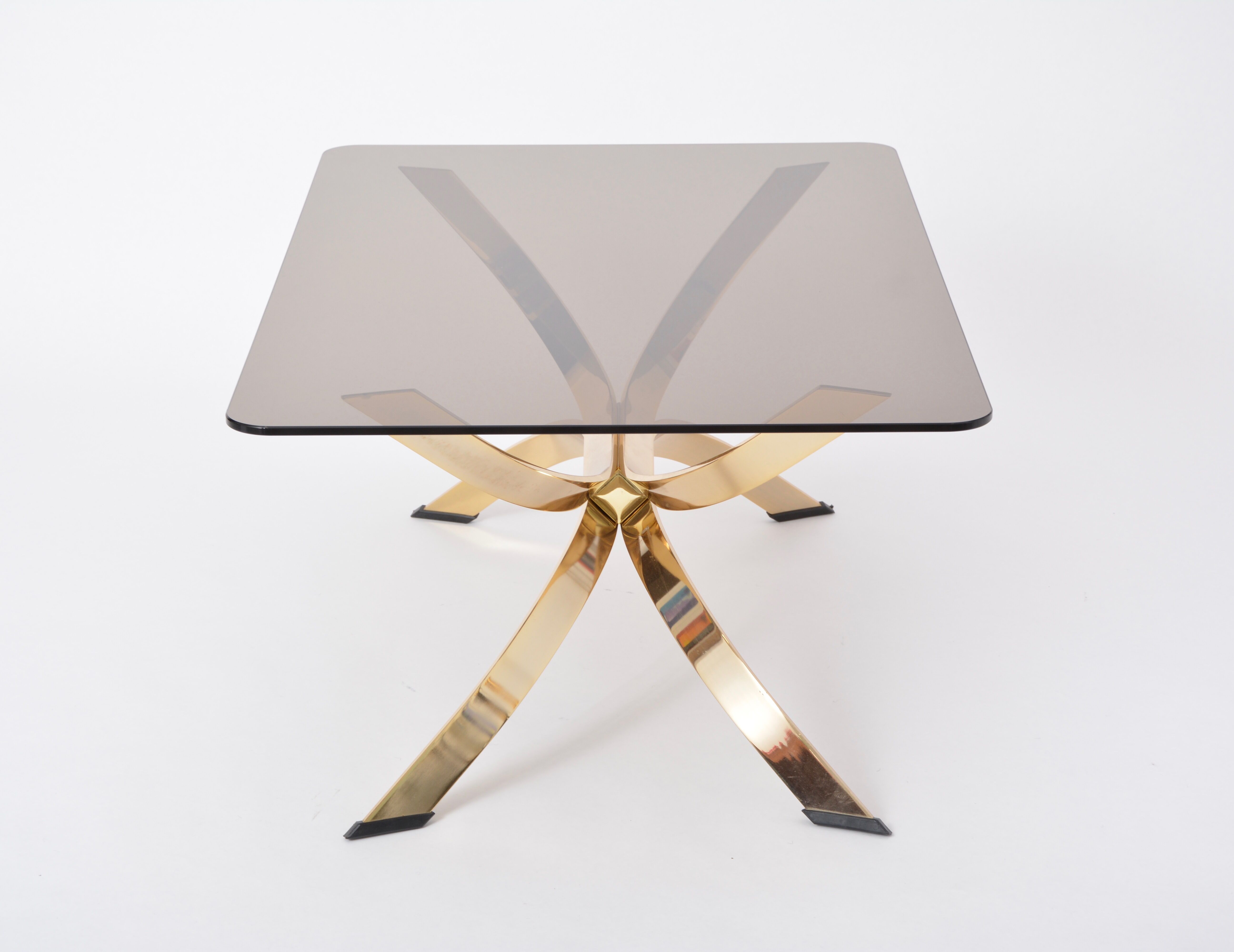 Gold Colored Mid-Century Modern coffee table with smoked Glass top
