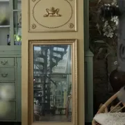 Louis XVI-style trumeau mirror with urn and dolphins – painted and gilded
