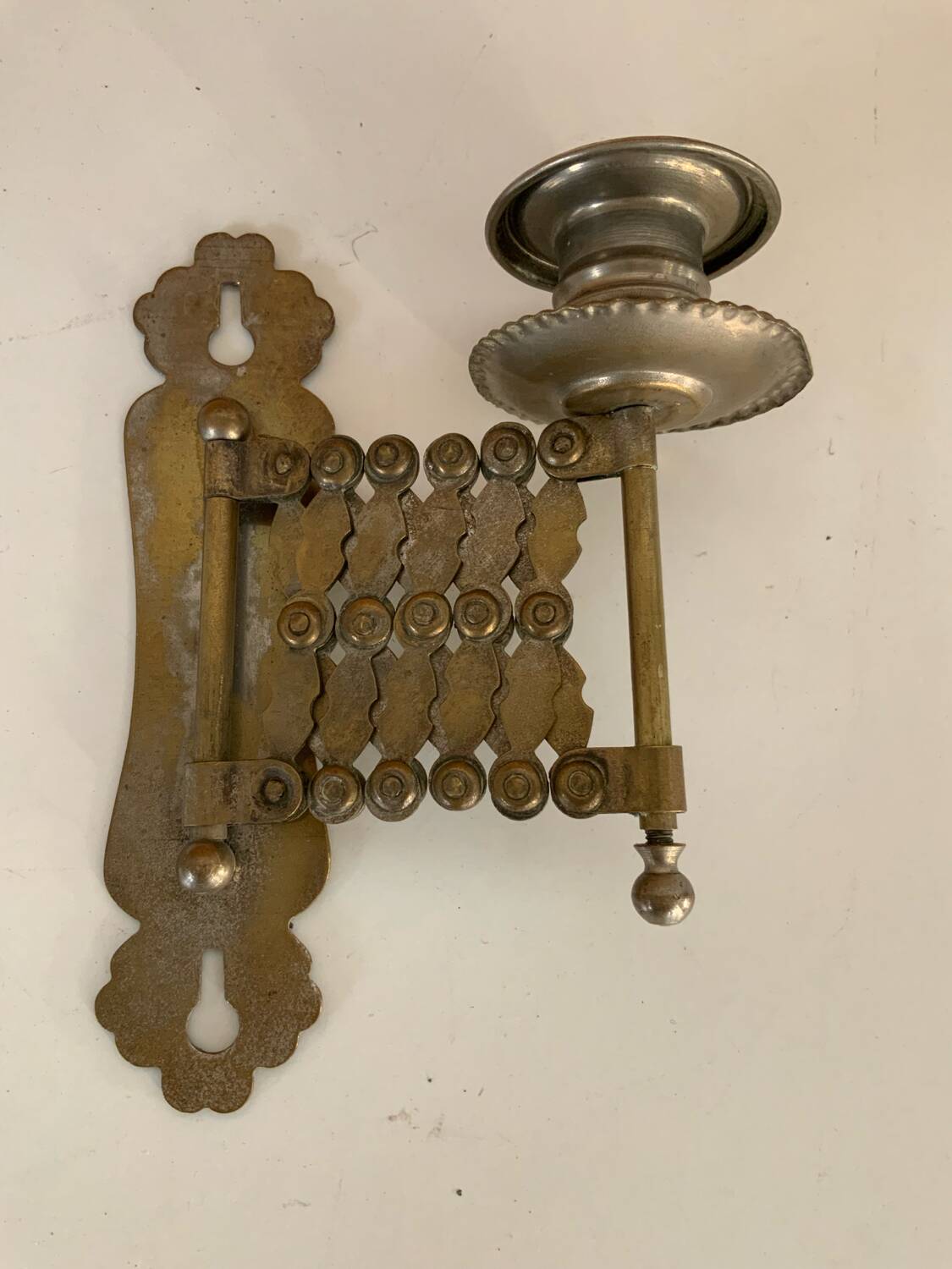 Old accordion candle holder