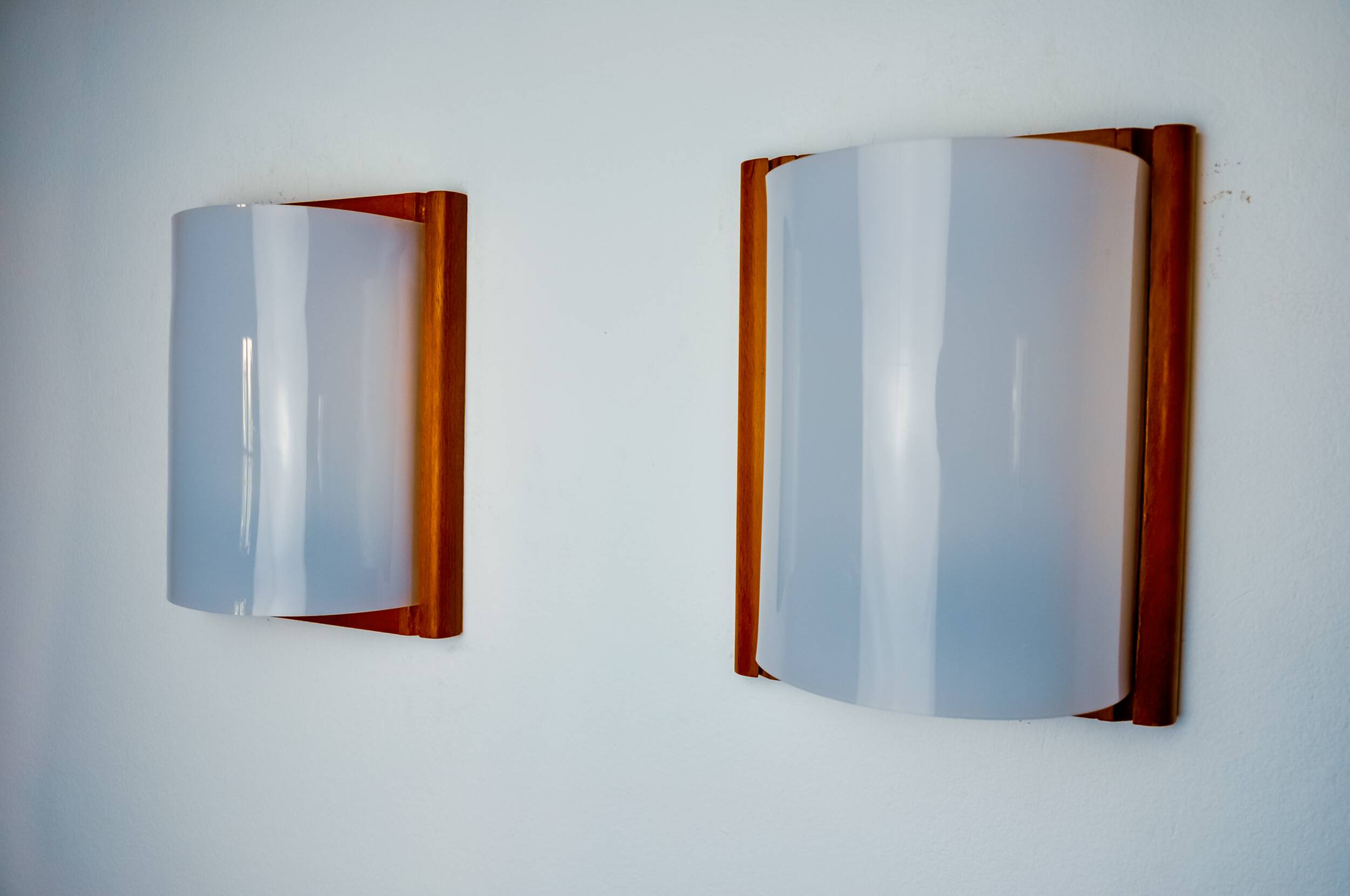 Pair of pine and methacrylate wall lights, Spain 1980