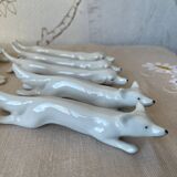 Set of 11 Art Deco zoomorphic knife holders