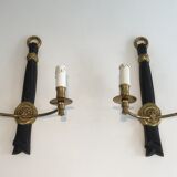 Pair of Black Lacquered Bronze Wall Lamps with Lions' Head Decorations. Around 1970