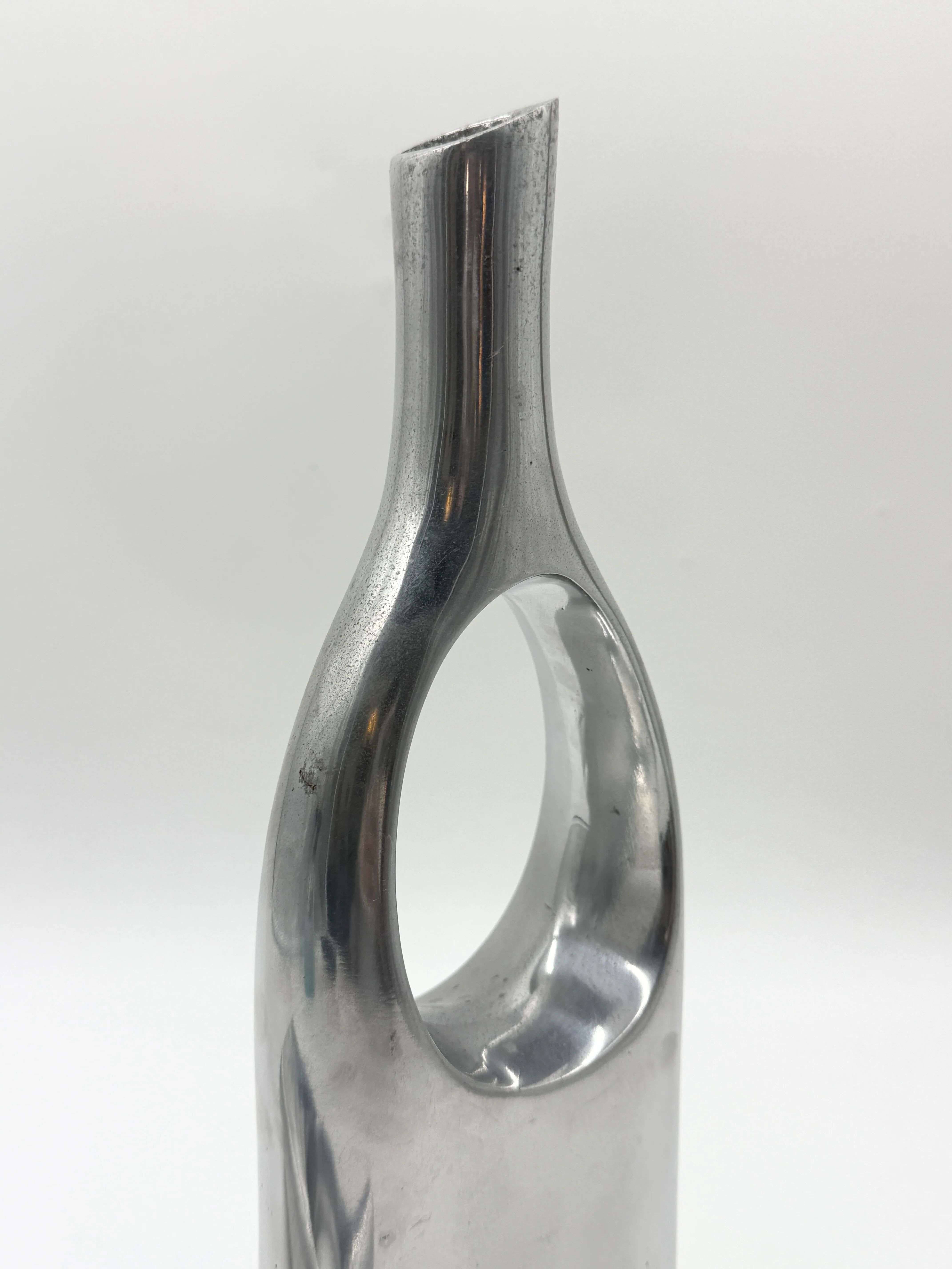 Pair of "drop" vases in aluminium cast, Italy, 1970s