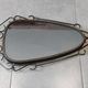 Mid-century modern iron mirror, brutalist, vintage organic, thick sixties.