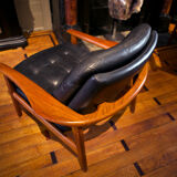 Pair of scandinavian armchairs in black leather and teak