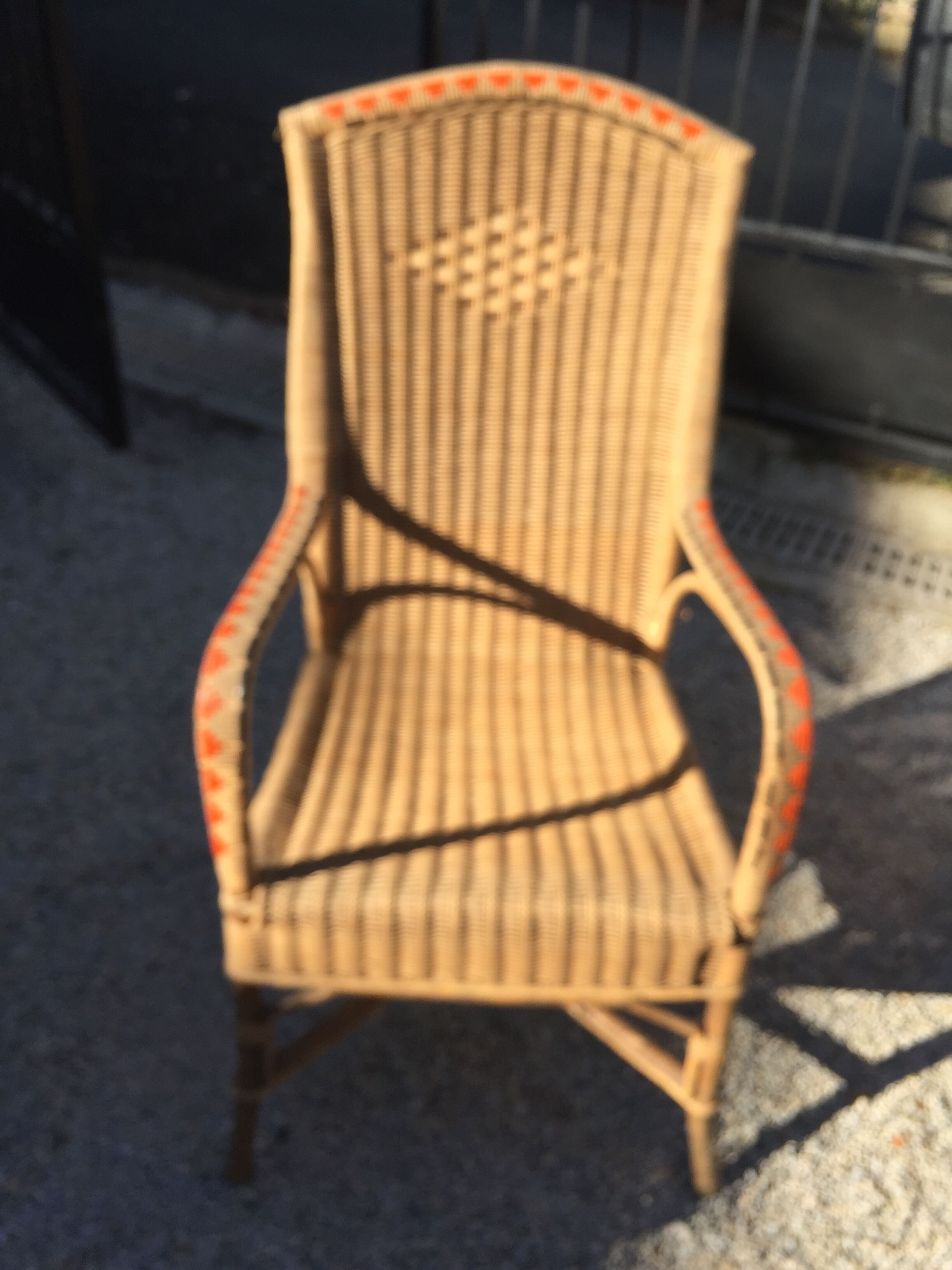Red vintage décor rattan armchair