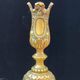 Pair of antique carved bronze candlesticks.
