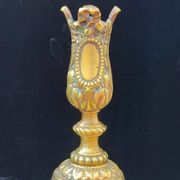Pair of antique carved bronze candlesticks.